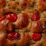 Rosemary perfumes homemade focaccia for sharing