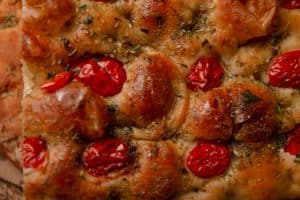 Rosemary perfumes homemade focaccia for sharing